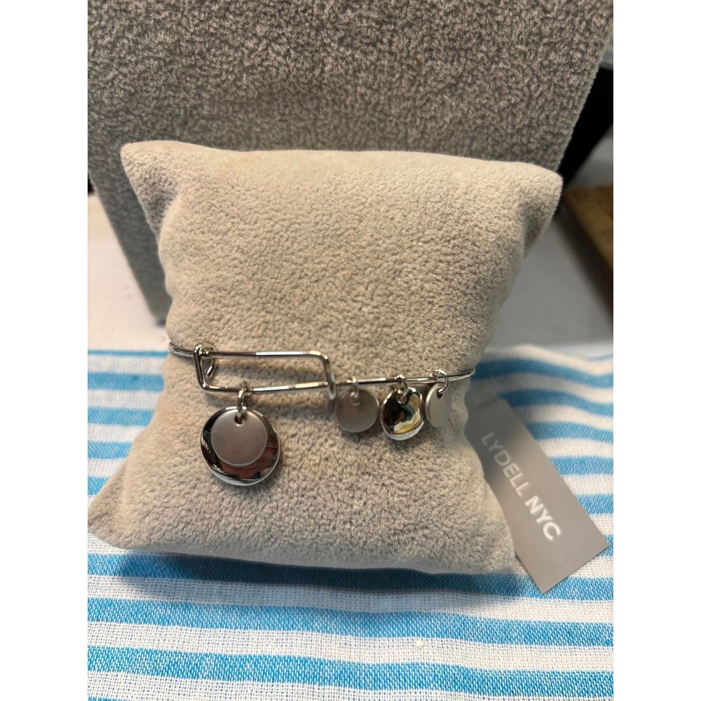 #27. Silver-tone Disc Charm Bracelet